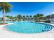 Relaxing community pool with a circular design and steps at 1770 Sawyer Palm Pl, Kissimmee, FL 34747