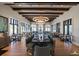 Elegant dining room with large windows and modern lighting at 1770 Sawyer Palm Pl, Kissimmee, FL 34747