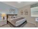 Spacious bedroom with king-size bed and calming decor at 1770 Sawyer Palm Pl, Kissimmee, FL 34747