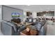 Open living room and kitchen with modern furniture and finishes at 1754 Caribbean View Ter, Kissimmee, FL 34747