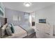 Main bedroom with ensuite bathroom and TV at 1754 Caribbean View Ter, Kissimmee, FL 34747
