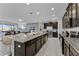 Modern kitchen with stainless steel appliances and ample counter and cabinet space at 1754 Caribbean View Ter, Kissimmee, FL 34747