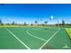 Outdoor community basketball court with two hoops at 1754 Caribbean View Ter, Kissimmee, FL 34747