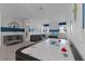 Game room with air hockey table and comfortable seating at 1754 Caribbean View Ter, Kissimmee, FL 34747