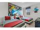 Two twin beds in an Alice in Wonderland-themed room at 1754 Caribbean View Ter, Kissimmee, FL 34747