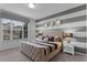 Spacious bedroom with a king-size bed and stylish decor at 1754 Caribbean View Ter, Kissimmee, FL 34747