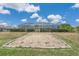 Spacious backyard with a screened pool and a large, open patio area at 720 Shore Drive, Kissimmee, FL 34744