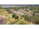 Aerial view showing home's waterfront location at 720 Shore Drive, Kissimmee, FL 34744