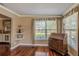 Bright living room with hardwood floors and built-in shelving at 720 Shore Drive, Kissimmee, FL 34744