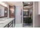 Spa-like bathroom with double vanity and walk-in shower at 720 Shore Drive, Kissimmee, FL 34744