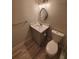 Clean bathroom with gray vanity, white toilet and shower at 714 Siena Palm Dr # 203, Celebration, FL 34747