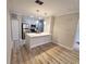 Modern kitchen with island and stainless steel appliances at 714 Siena Palm Dr # 203, Celebration, FL 34747