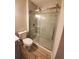 Bathroom with a large glass shower and marble tile at 714 Siena Palm Dr # 203, Celebration, FL 34747