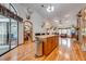 Open concept kitchen with island and wood flooring at 4450 Kaiser Ave, St Cloud, FL 34772