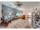 Open concept living room with hardwood floors at 4450 Kaiser Ave, St Cloud, FL 34772