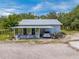 Small guest house with screened porch and carport at 4450 Kaiser Ave, St Cloud, FL 34772