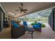 Covered patio with seating and pool view at 4450 Kaiser Ave, St Cloud, FL 34772