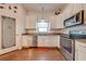 Updated kitchen with stainless steel appliances and pantry at 4450 Kaiser Ave, St Cloud, FL 34772