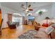Relaxing living room with access to the screened lanai at 4450 Kaiser Ave, St Cloud, FL 34772