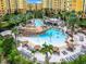 Resort-style pool with a pirate ship water feature and plenty of lounge chairs at 8125 Resort Village Dr # 51104, Orlando, FL 32821