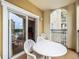 Private balcony with outdoor seating overlooking a scenic view at 8125 Resort Village Dr # 51104, Orlando, FL 32821