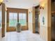 Well lit hallway with elevators and access to upper floor condo units at 8125 Resort Village Dr # 51104, Orlando, FL 32821