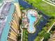 Building and resort pool with pirate ship theme and landscaping at 8125 Resort Village Dr # 51104, Orlando, FL 32821