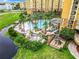Resort pool with pirate ship, playground, and surrounding landscaping at 8125 Resort Village Dr # 51104, Orlando, FL 32821