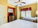 Guest bedroom with two twin beds and a dresser at 8125 Resort Village Dr # 51104, Orlando, FL 32821