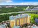 High-rise building with partial view of resort pool and surrounding area at 8125 Resort Village Dr # 51104, Orlando, FL 32821
