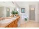 Bathroom with double vanity, garden tub and shower at 8612 La Isla Dr, Kissimmee, FL 34747