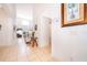 Bright and spacious entrance hall with tiled floors and stairs at 8612 La Isla Dr, Kissimmee, FL 34747