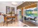 Breakfast area with sliding doors leading to screened patio and pool at 8612 La Isla Dr, Kissimmee, FL 34747