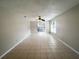 Bright living room featuring tile floors and large windows at 3180 Owassa Ct, Kissimmee, FL 34746