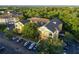 Aerial view of condo building, parking and landscape at 3593 Conroy Rd # 437, Orlando, FL 32839