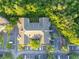 Aerial view of condo building and surrounding trees at 3593 Conroy Rd # 437, Orlando, FL 32839