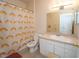 Clean bathroom with shower/tub, toilet and vanity at 3593 Conroy Rd # 437, Orlando, FL 32839
