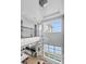 Two-story foyer with a grand chandelier and views to the kitchen and living areas at 494 Muirfield Loop, Reunion, FL 34747