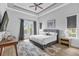 Spacious main bedroom featuring French doors leading to balcony at 494 Muirfield Loop, Reunion, FL 34747