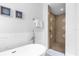 Spa-like bathroom featuring a soaking tub and shower at 494 Muirfield Loop, Reunion, FL 34747