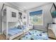 Charming bedroom with built-in bunk bed and playful decor at 494 Muirfield Loop, Reunion, FL 34747