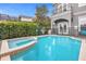 Refreshing pool and spa area, ideal for outdoor enjoyment at 494 Muirfield Loop, Reunion, FL 34747