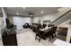 Combined living and dining area with tile flooring and plenty of natural light at 701 Virtuoso Ln # 81, Orlando, FL 32824