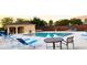 Community pool with plenty of lounge chairs at 701 Virtuoso Ln # 81, Orlando, FL 32824