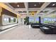 Spacious living room with marble floors and a large sectional sofa at 1125 Grand Traverse Pkwy, Reunion, FL 34747