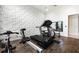 Modern home gym with treadmill, elliptical, and rowing machine at 1125 Grand Traverse Pkwy, Reunion, FL 34747