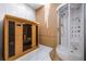 Relaxing bathroom with a sauna and a large walk-in shower at 1125 Grand Traverse Pkwy, Reunion, FL 34747