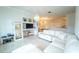 Spacious living room with sectional sofa and TV at 3593 Conroy Rd # 437, Orlando, FL 32839