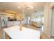 Open concept dining room and kitchen with modern decor at 3593 Conroy Rd # 437, Orlando, FL 32839