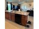 Open concept kitchen with an island and black appliances at 2513 Rock Pl, Kissimmee, FL 34759